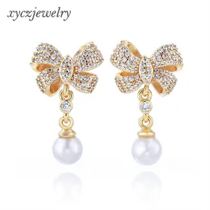 Xingyu-pendientes de perlas de mariposa blanca personalizados, joyería privada, aretes de gota de latón con lazo