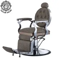 Cadeira antiga do barbeiro com cadeira do barbeiro do ouro para o homem  cadeira do barbeiro