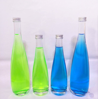Fournisseur chinois Meilleur vendeur evian Bouteille d'eau minérale pour boisson Bouteille en verre d'eau gazeuse de source avec bouchon en alun 330ml