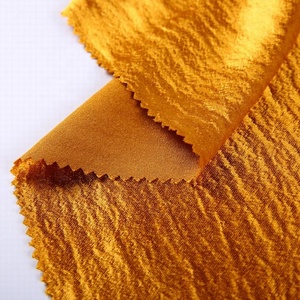 <span class=keywords><strong>Tela</strong></span> Crepé Japonesa de Satén Grueso Teñida de Amarillo con Estampado Dorado, 100% Poliéster Elástico - Product Image 2