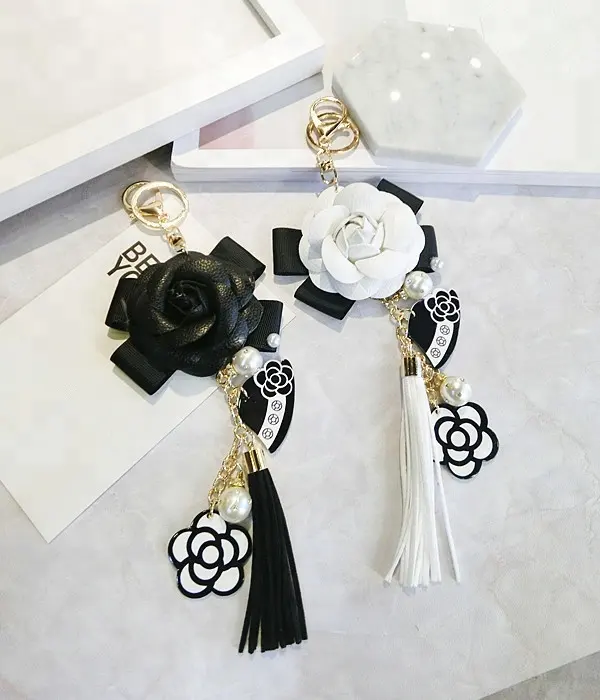 Nuevo Negro Blanco Flor de Camelia de cuero llavero de moda de las mujeres flor llave cadenas para teléfono móvil bolso