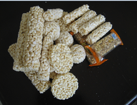 Machine à découper et à emballer pour céréales, machine à moulage et à remplissage de céréales, ligne de production de snacks et de riz farcis populaire