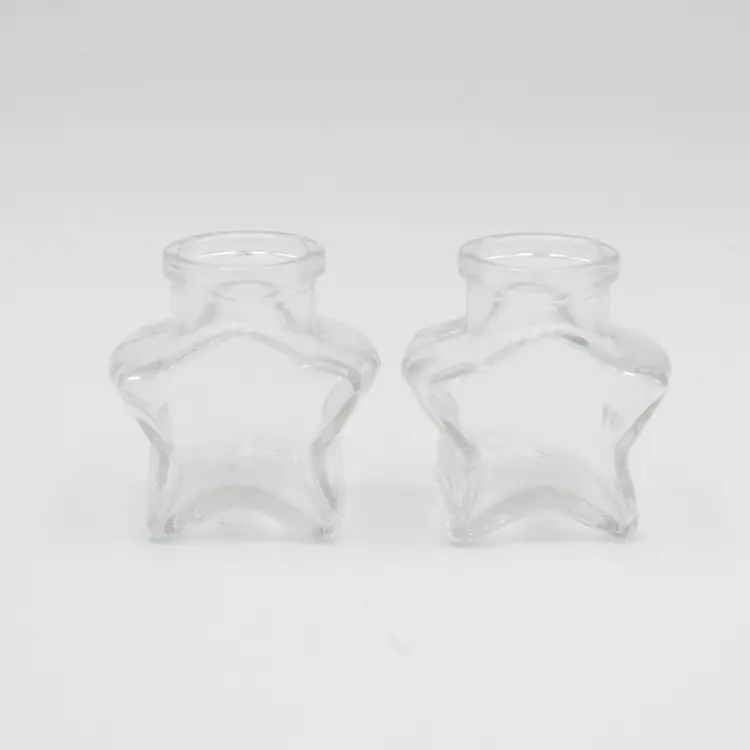 赤ちゃんのためのコルクジャムガラス瓶ミニガラス瓶と空の星型ガラス瓶
