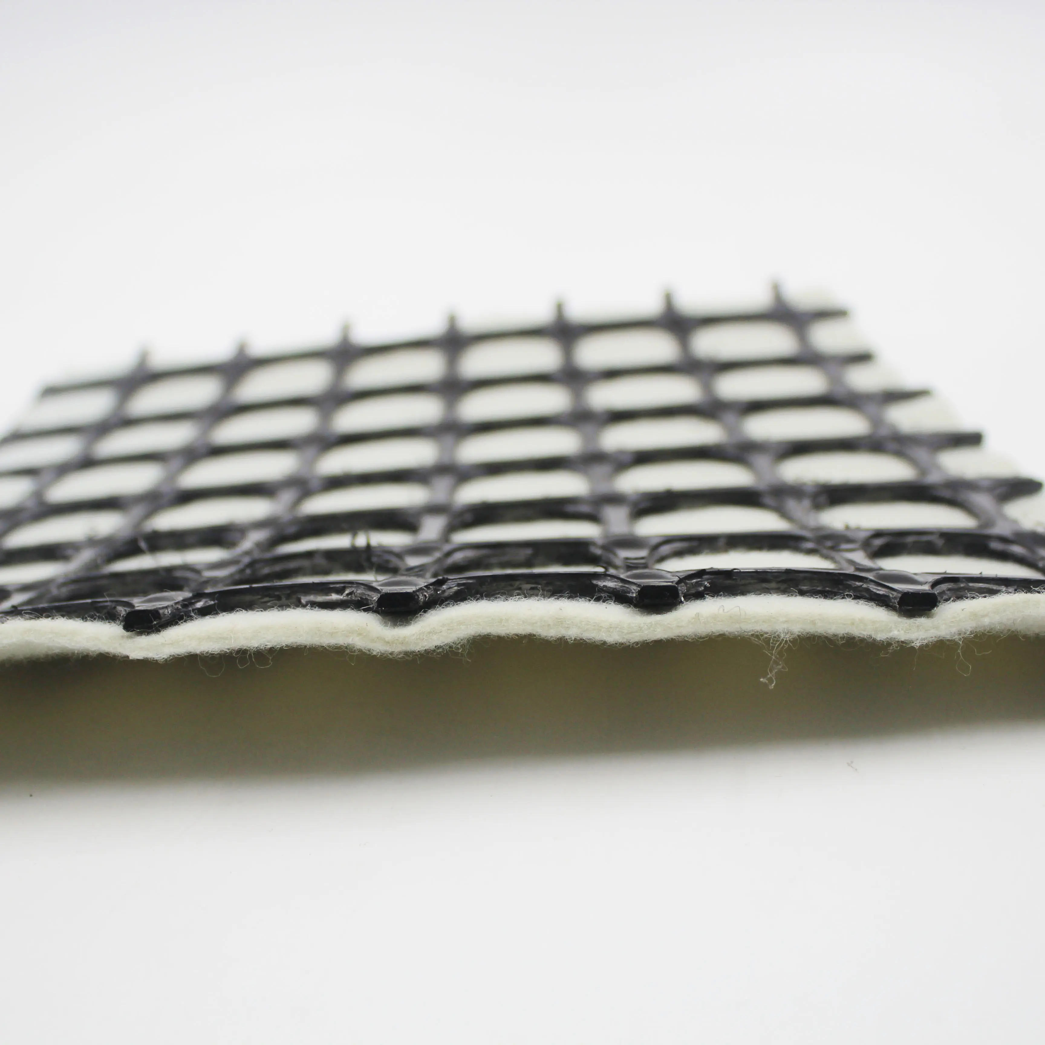 400g m2 geotextil nonwoven biaxial plastic geogrid composite geogrid for soil stabilization