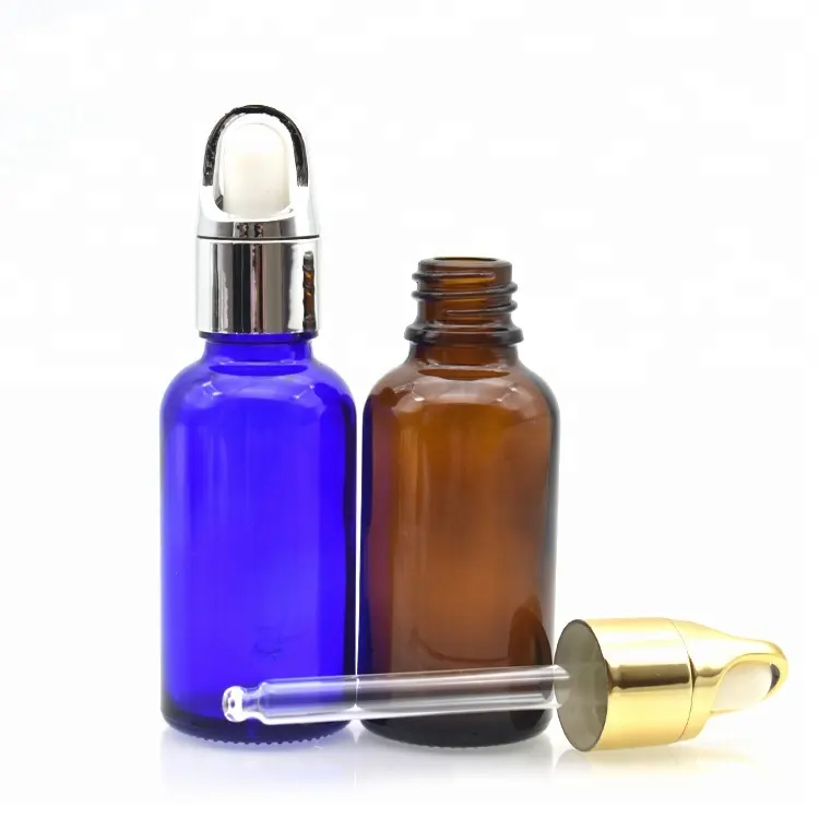 Hot Sale empty essential oil clear blue 5ml 10ml 50ml 100ml 15ml 20ml 30ml amber glass dropper bottle with flower basket lid