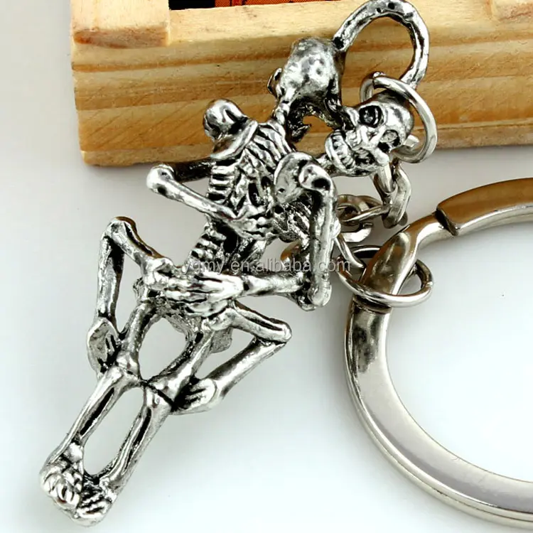 Llavero plegable con colgante de esqueleto para hombre y mujer, llavero de aleación de metal de color plateado antiguo con diseño de calavera y llavero