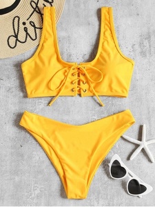 KY Venta al por mayor de amarillo brillante para dama joven con cordones acolchado Bikini Set Fitness traje de baño ropa de playa - Product Image 3