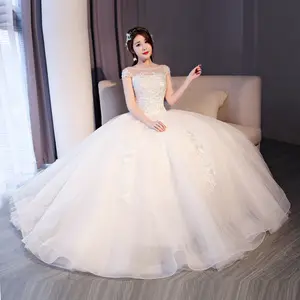 2018 European Fantasy Floor Length Pearl Beaded Ivory White Cap Sleeve Wedding Gown