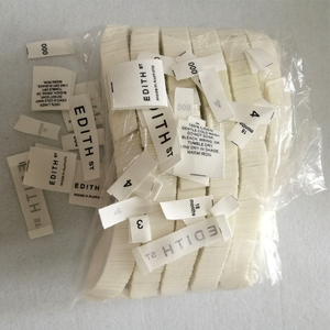 Etiquetas de roupas dobráveis do costura do algodão orgânico 100%
