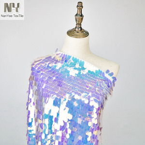 Nanyee textil al por mayor 2.5 cm melón iridiscente lentejuela tela - Product Image 1