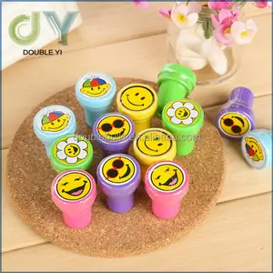 Custom cartoon smile face plastic stamp, children mini stamp toy