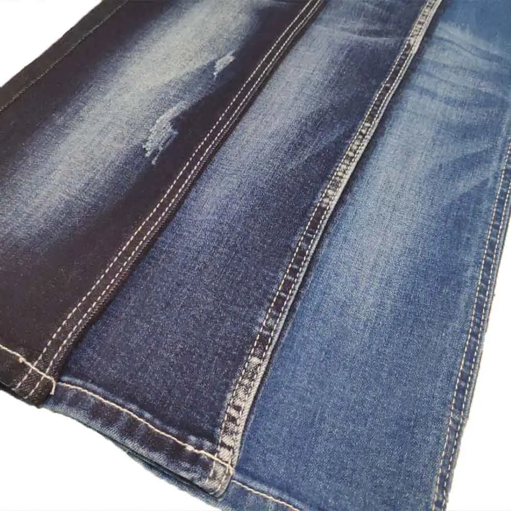 Cheap price soft touch twill fabric power stretch denim jeans fabric for women