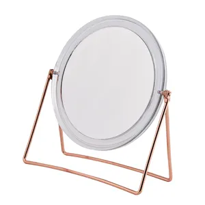 Espelho de mesa redondo dupla face, com estrutura de metal
