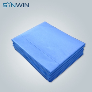 100% <span class=keywords><strong>Polypropylene</strong></span> अस्पताल के मेडिकल गैर बुना बिस्तर शीट रोल कपड़े निविड़ अंधकार गैर बुना डिस्पोजेबल नीले अस्पताल के बिस्तर शीट