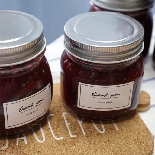 Round glass jar for honey jam with airtight lid