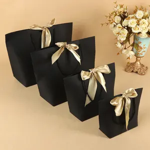 Bolsas de regalo de diseño elegante, bolsa de compras barata, bolsa de embalaje de papel