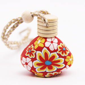 Botella difusora de vidrio para coche vacía colgante personalizada de 15ml con arcilla polimérica para decoración de paredes - Product Image 1