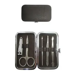 Brown nail care tools set in portable case, grooming metal manicure pedicure kit, custom mini stainless steel nail art tool set