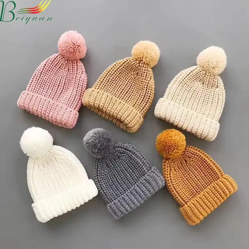 Yeni bebek erkek ve kız sonbahar ve kış kalın sıcak güzel şeker düz renk şapka örgü şapka çocuklar için