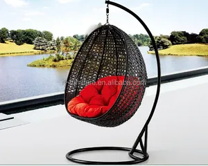 Popular silla colgante de jardín con cojín, Columpio de ratán en forma de huevo de un solo asiento, columpio moderno de ratán para patio con soporte