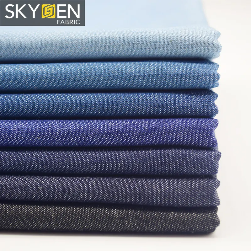 Skygen wholesale bulk stock cheap brazil colombia bangladesh 100%cotton black blue twill denim fabric for sale