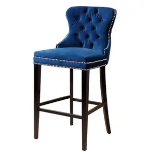 American style blue velvet upholstered rivet bar stool wooded foot high back