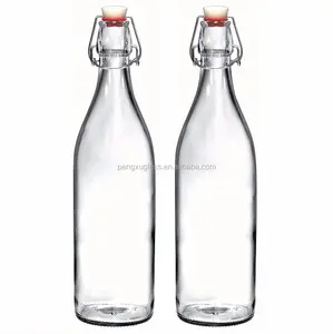 散装32盎司圆形玻璃1升水瓶，用于带摇摆顶部的火花饮料