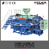 Machine de moulage par injection de semelles en PVC à soufflage d'air pour sandales et pantoufles rotatives automatiques monocouleur KCLKA