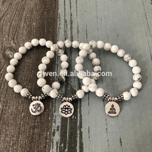 SN1324 Hombres Mujeres Mala OM <span class=keywords><strong>Lotus</strong></span> Buddha Charm <span class=keywords><strong>Pulsera</strong></span> con cuentas de howlita Boho Yoga <span class=keywords><strong>Pulsera</strong></span> de joyería blanca - Product Image 1