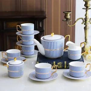 रॉयल अरबी सिरेमिक कॉफी सेट 15 पीसी चीनी मिट्टी के नीले चाय के कप तश्तरी चायदानी के साथ दूध के बर्तन चीनी जार आपके लोगो के साथ