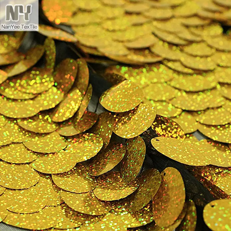 Nanyee textiles vender por el patio de oro Oval en forma de tela de lentejuelas