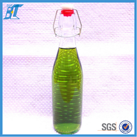 Bouteille en verre vide de 500 ml (17 oz) pour liqueur avec bouchons hermétiques en caoutchouc