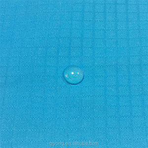 Venta caliente suave delgada 0.2 cm ripstop 100% nylon 40D tafetán tela impermeable para ropa protectora - Product Image 1