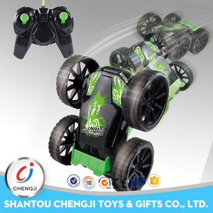 Lo nuevo de 4 canales 4 ruedas gira alrededor del lado del doble 360 rc juguete del truco del coche rodando - Product Image 1