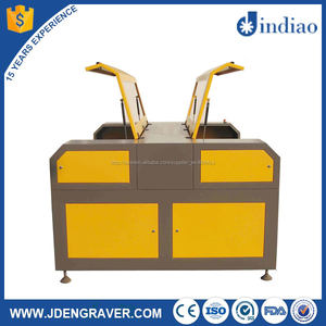 Precio barato tela de cuero máquinas de corte por láser con 2 cabezales láser - Product Image 1