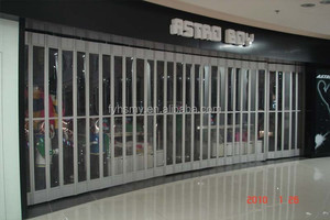 Grille de sécurité en aluminium PVC coulissante commerciale en accordéon Porte pliante en polycarbonate transparent pour l'entrée du magasin - Product Image 4