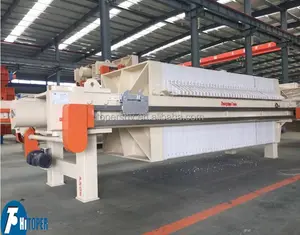 Slurry filter press with automatic filter cloth washing