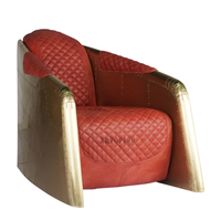 Fauteuil de salon en tôle d'aluminium au design vintage
