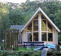 Maison en bois idéale pour une maison en bois, avec de grandes fenêtres, à prix bas