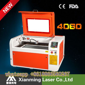 Co2 60 w pas cher laser équipement usine graver sur le bambou bois arylic de gravure laser machine de découpe à vendre - Product Image 1