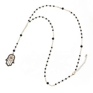 <span class=keywords><strong>Collana</strong></span> pendente a forma <span class=keywords><strong>di</strong></span> <span class=keywords><strong>mano</strong></span> <span class=keywords><strong>con</strong></span> perline <span class=keywords><strong>di</strong></span> cristallo nero lunga e fatta a <span class=keywords><strong>mano</strong></span> <span class=keywords><strong>di</strong></span> migliore qualità - Product Image 1