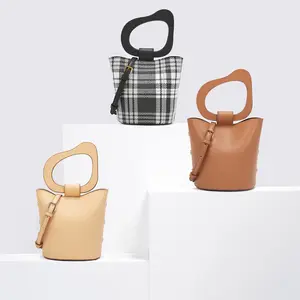 Bolso de hombro cruzado con asa Irregular para mujer, bolsa de mano con etiqueta privada, a la moda, oem