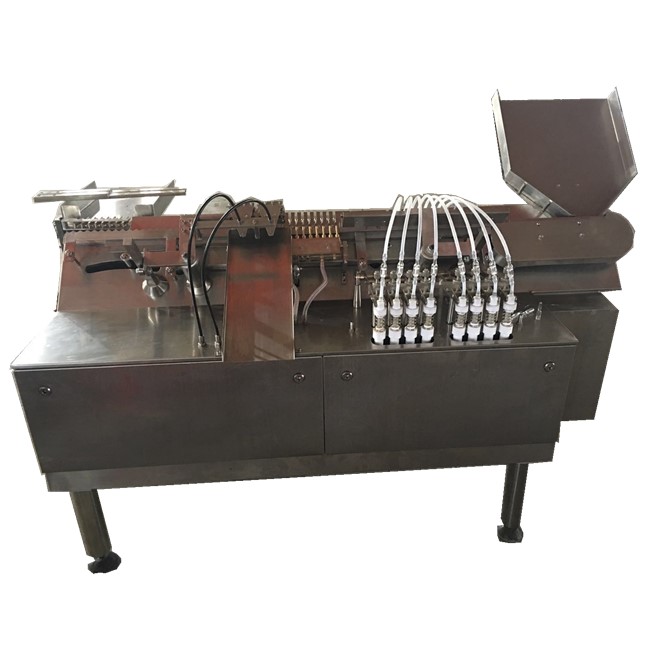 Аппарат ALG для розлива и герметизации флаконов с несколькими головками, также представляет собой стеклянную бутылку с узким горлышком для жидкости