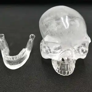 Amazing carved clear crystal skulls with live chin for sale