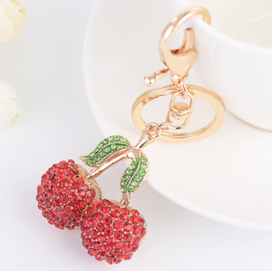 Venta al por mayor en existencias exquisito bolso encantos accesorio mujer lindo 3D metal rhinestone cereza llavero - Product Image 3
