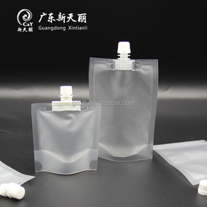 Wholesale front clear small sachet bags flip Top nozzle Stand Up Spout Pouch plastic cosmetic bags Packing