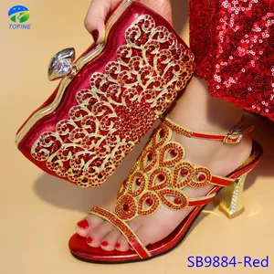 2019 New coming fashion red low heels nigerian shoes and matching clutch bag