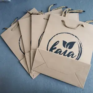 लक्जरी डिजाइन कस्टम लोगो मुद्रित पेपर बैग उपहार शॉपिंग पैकेजिंग के लिए क्राफ्ट पेपर बैग