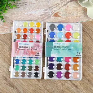 Trockene Aquarell palette mit Pinsel zum Malen, heller Aquarell kuchen