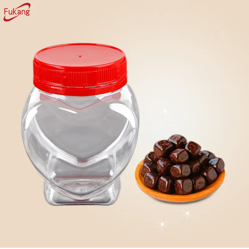 Bottiglie di plastica del commercio all'ingrosso 200ml a forma di cuore piccolo pet trasparente barattolo di plastica per caramelle, tè, frutta a guscio, miele, cioccolato